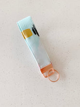 Load image into Gallery viewer, treats & the city key fob