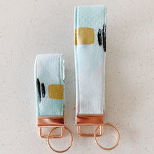 Load image into Gallery viewer, treats & the city key fob